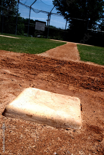 Photo: Baseball base on the infield Baseball base on the infield