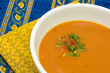 Red pepper and tomato soup on a mediterranean tablecloth