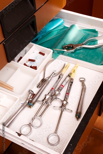 Photo: A dentists tools in a drawyer for dental work on patient. A dentists tools in a drawyer for dental work on patient.