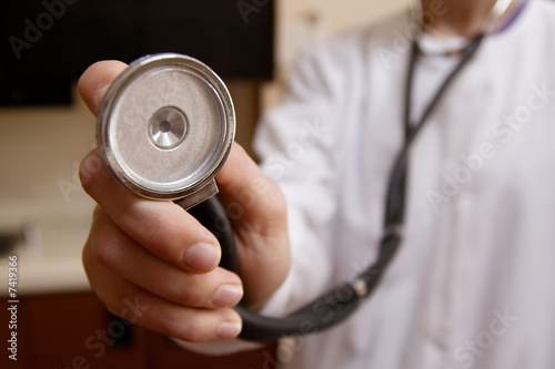 Photo: Stethoscope on a doctor on white lab coat Stethoscope on a doctor on white lab coat