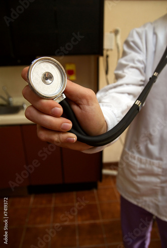 Photo: Stethoscope on a doctor on white lab coat Stethoscope on a doctor on white lab coat