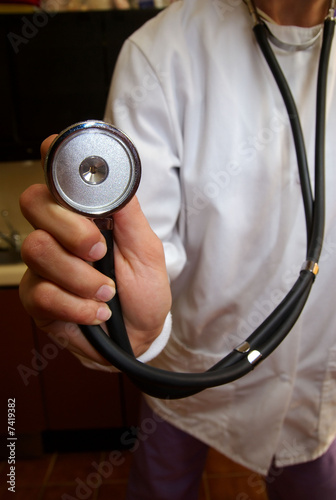 Photo: Stethoscope on a doctor on white lab coat Stethoscope on a doctor on white lab coat