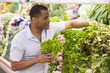 Man shopping in produce section
