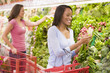 Woman shopping in produce section