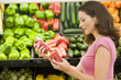 Woman choosing fresh produce