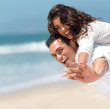 Loving couple having fun on the beach