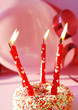 happy birthday candles in pink