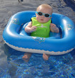 baby relaxing in the pool