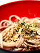 Japanese noodle soba with seaweed flakes and soba tsuyu
