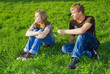 Photo: Young couple on the grass Young couple on the grass
