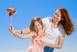 Happy mother and daughter having fun