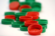 red & green milk bottle lids..