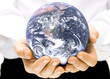 The globe in children's hands
