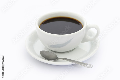 Cup of coffee with tea spoon