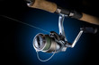 Fishing reel, mounted on a fishing rod Fishing reel, mounted on a fishing rod