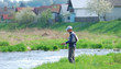 Fisherman angling on the river