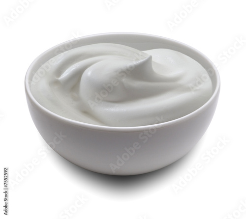 Foto: White pot filled with white cream White pot filled with white cream