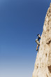 Man Free Climbing on Cliff