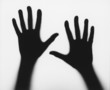 Black silhouettes of human hands against white background, b&w