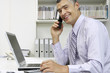Businessman Working on a Laptop