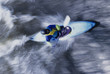 Kayaker Hitting the Rapids