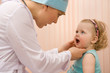 Photo: Doctor pediatrician exam baby mouth Doctor pediatrician exam baby mouth