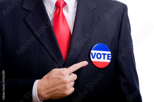 Photo: Man pointing at Vote button Man pointing at Vote button