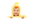 Boy in chicken costume holding sign