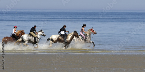 cavaliers sur la plage