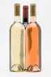red white and rose wine bottles