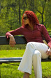 Beautiful young women on bench in park