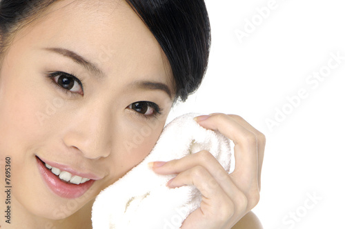 Photo: Beautiful Asian woman and orchid Beautiful Asian woman and orchid