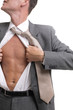 release!young businessman  pulling his shirt open