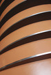 Gray metal waves on orange ground