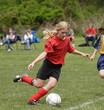 A fényképek részletei Ifjúsági Teen Soccer Player Field kész Kick Ball