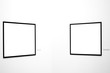 Two empty frames on white wall Two empty frames on white wall