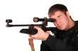 young man to aim from sniper gun