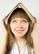 Happy girl holding book