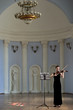 The beauty brunette plays the violin in concert hall The beauty brunette plays the violin in concert hall