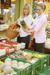 two women on the fruit market