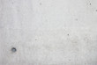 Concrete slab with asymetrically placed mounting hole
