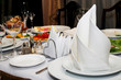 Table with wineglass and napkin in restaurant