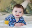 Baby Boy Posing in Striped Outfit