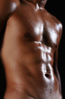 A naked young asian male body with well-toned muscles