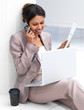 Businesswoman using cellphone
