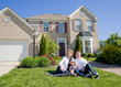 Family in Front of House