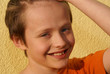 The person smiling boy.