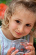 Beautiful blond girl with glass