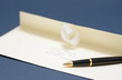 a letter and a pen