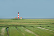 Foto: Küstenlandschaft mit Leuchtturm Küstenlandschaft mit Leuchtturm